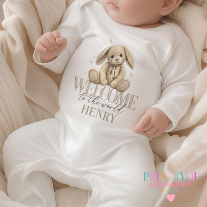 Personalised welcome to the world bunny baby vest with the baby's name printed on soft cotton.