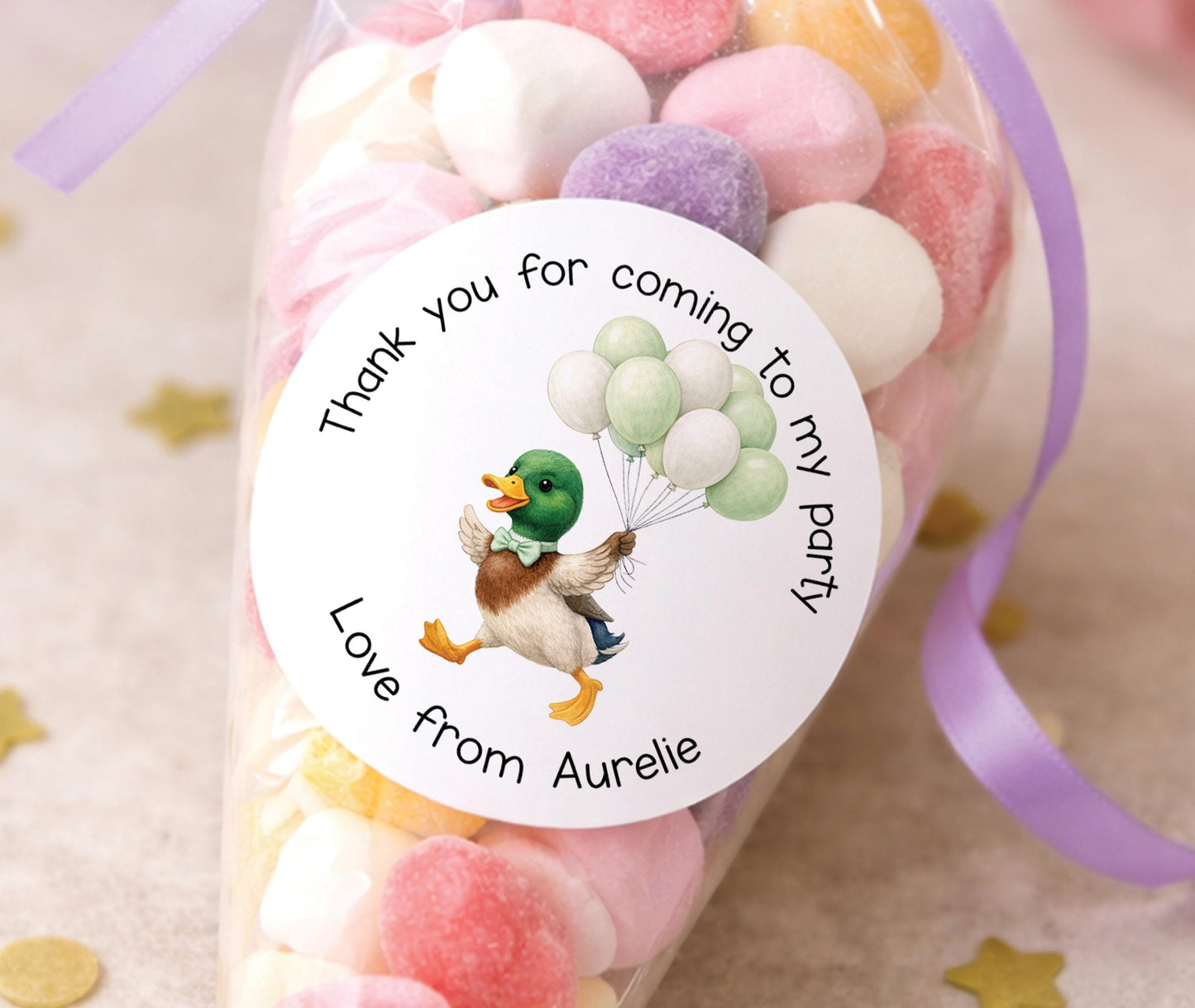 Sheet of personalised glossy duck stickers featuring a cute yellow duckling design with a custom name, ideal for party bags and sweet cones.