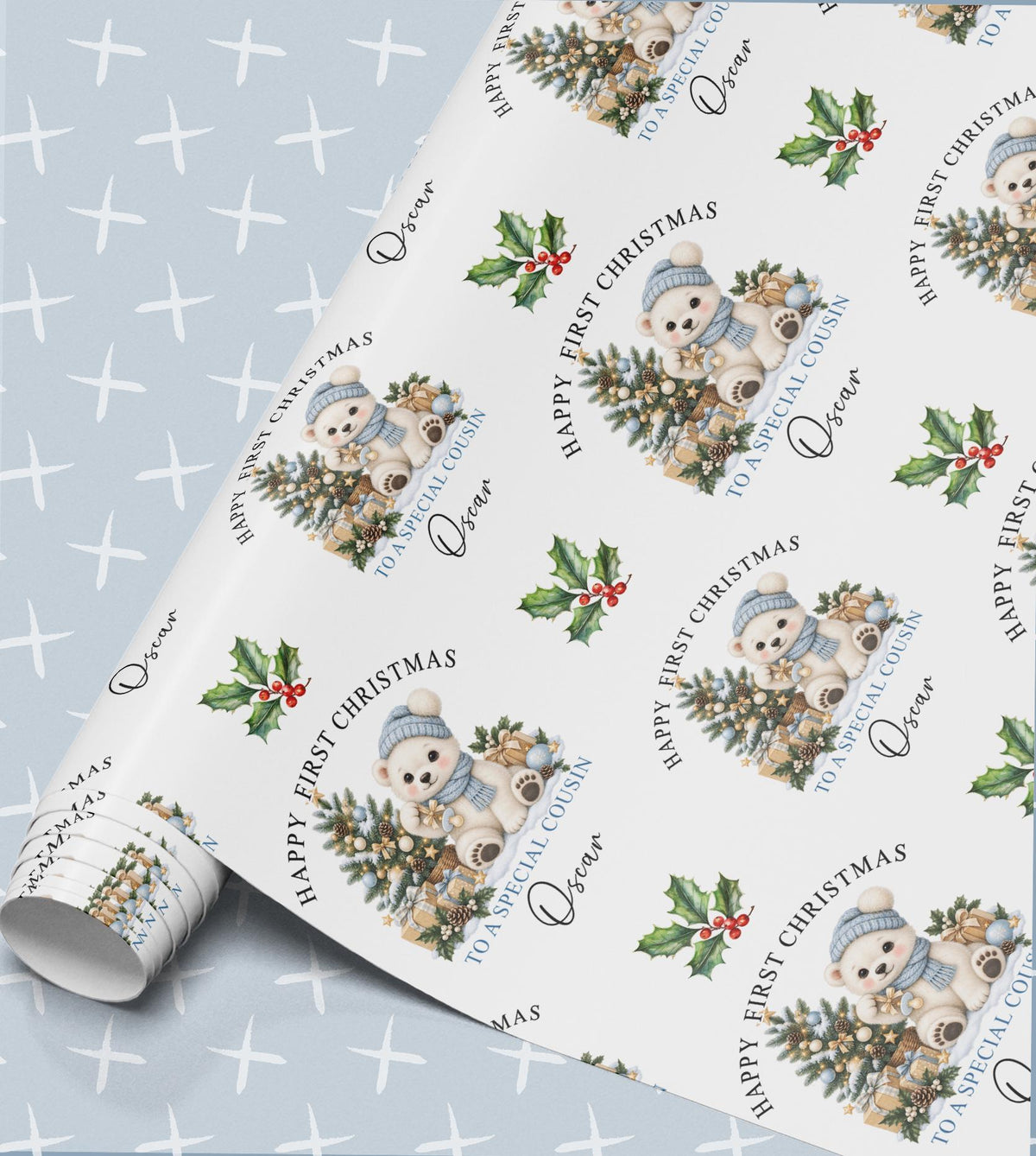 Personalised baby's first Christmas wrapping paper in pale blue with a polar bear in a bobble hat, Christmas tree and holly, relation and name
