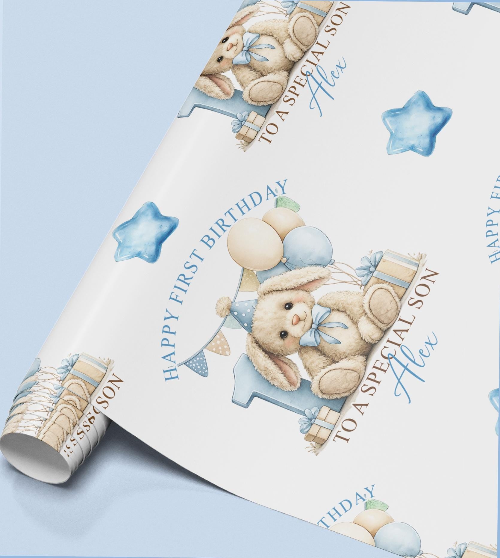 Roll of personalised first birthday wrapping paper featuring a repeating blue bunny, number one and balloon design.