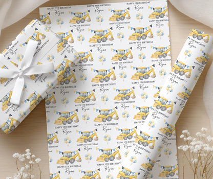 Close-up detail of the digger and construction vehicle pattern with personalised name and age