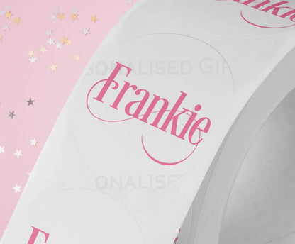 Personalised colourful festive name sticker size comparison for scale