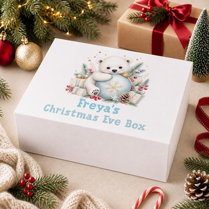 Personalised Christmas Eve box, white magnetic gift box printed with polar bears and a blue snowflake and a name above Christmas Eve Box