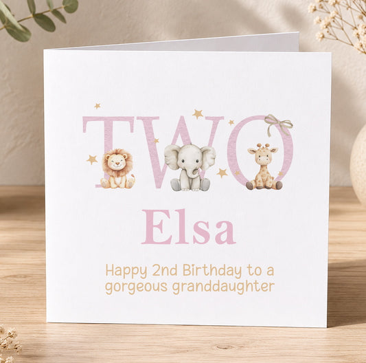 Personalised second birthday card featuring a pink safari design with a lion, elephant and giraffe, shown with a personalisation example for Elsa