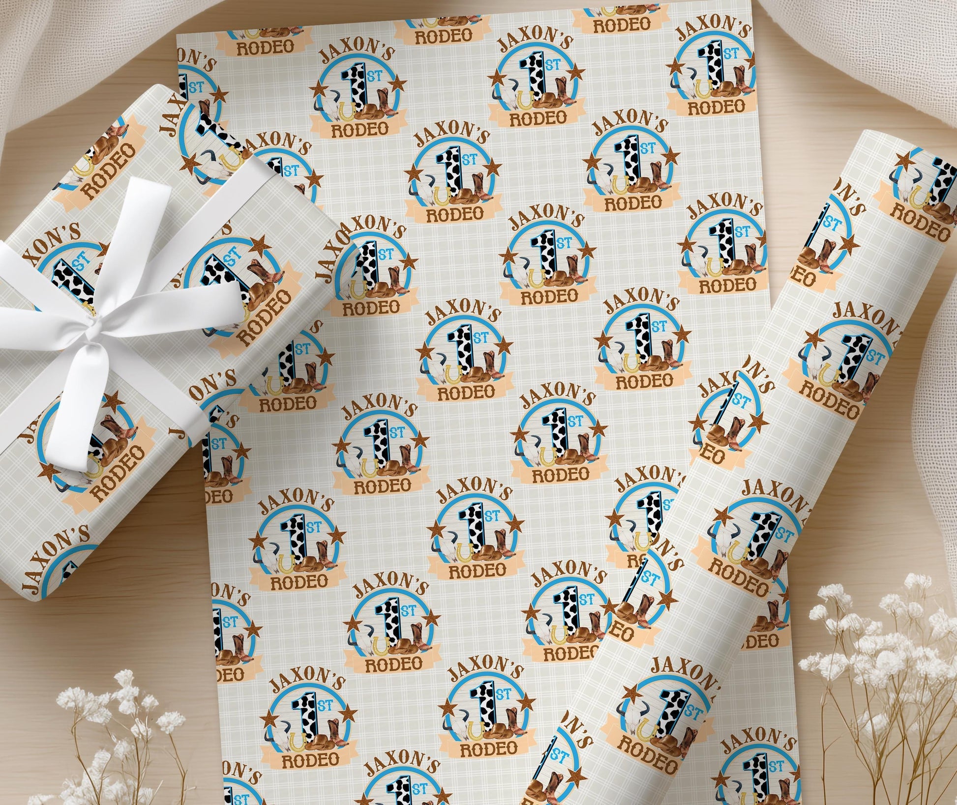 Cowboy-themed rodeo wrapping paper with repeated 'RODEO' text, finished with a white ribbon on a wooden surface.