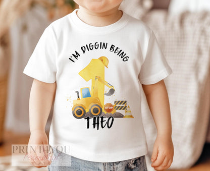 Personalised construction digger t-shirt for kids, close-up of custom name and birthday number print