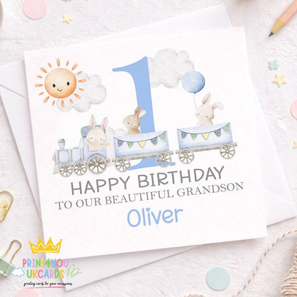 Square personalised birthday card featuring a blue train and bunny design with space for a custom name and age