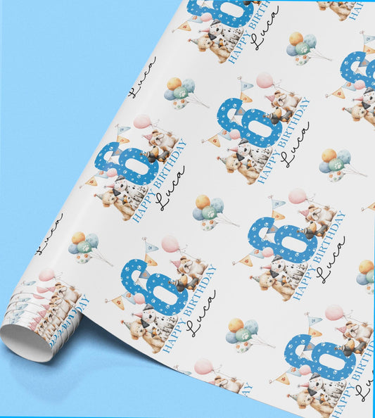 The image is a roll of wrapping paper with a repeating pattern of birthday-themed elements, including balloons, teddy bears, and the number 6.