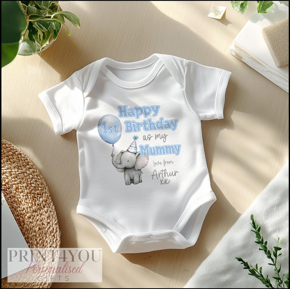 Personalised cute elephant vest printed with 'Happy 1st Birthday' and your baby's name.