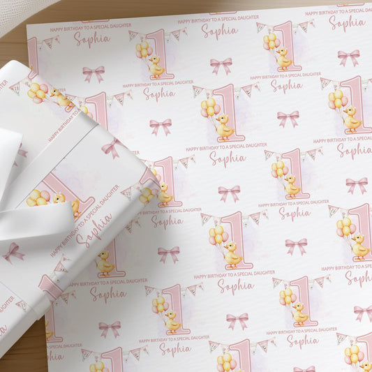 Printed 1st birthday wrapping paper shown as wrapping paper