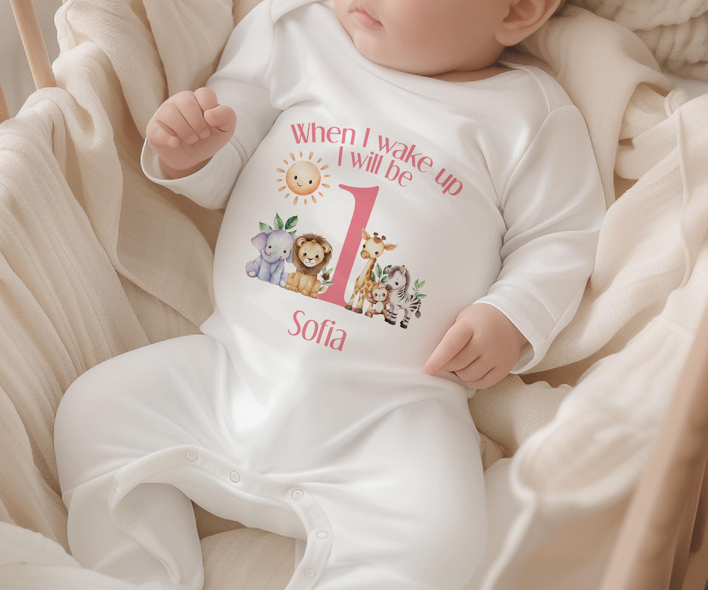 Personalised pink safari first birthday sleepsuit with custom name print