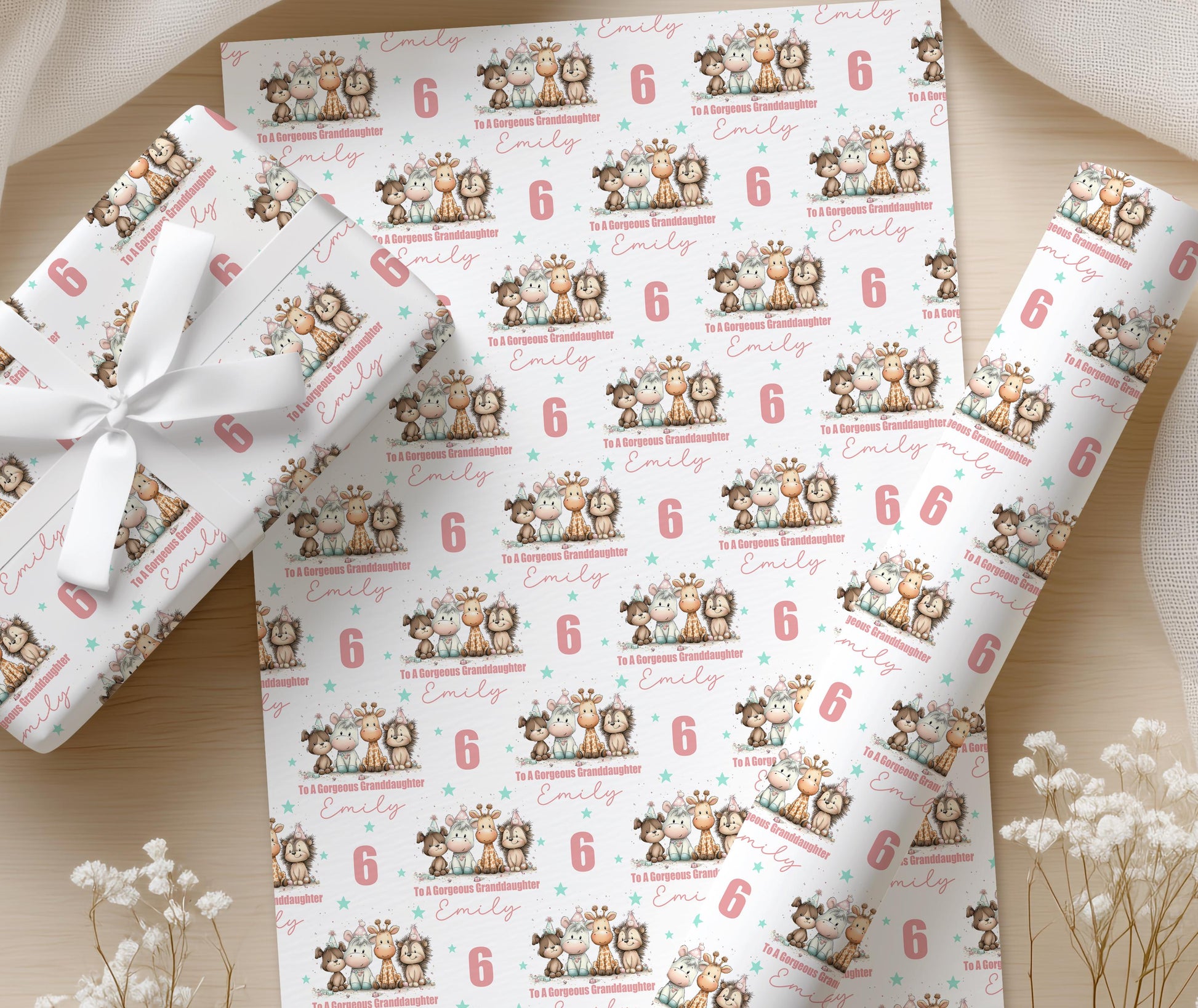 Close-up detail of the dog, horse and giraffe pattern with personalised name and age