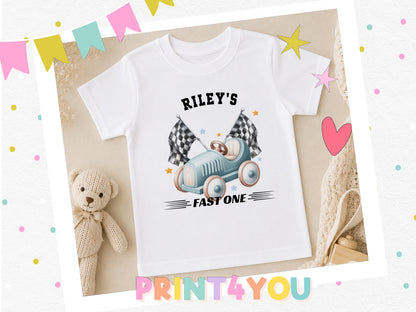 Personalised racing car birthday t-shirt printed with a race car and 'Riley's FAST ONE', styled with a teddy bear, a heart and a star.