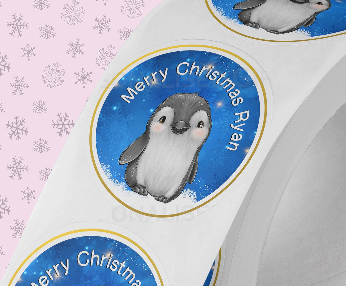 Personalised Father Christmas sticker with a custom name, used as a gift tag on a wrapped Christmas present