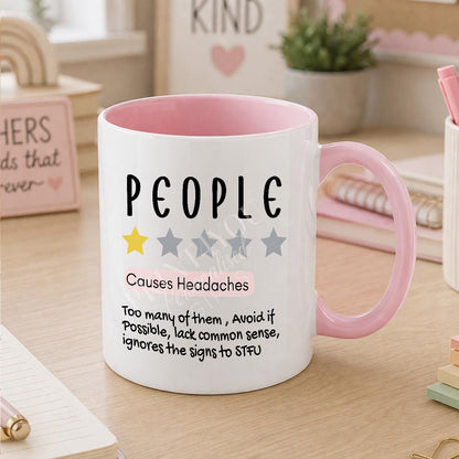 White ceramic mug printed with 'People Cause Headaches' sarcastic office humour design, personalised with a name