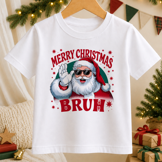 A white t-shirt with a graphic design featuring a smiling Santa Claus wearing sunglasses and the text "MERRY CHRISTMAS BRUH"