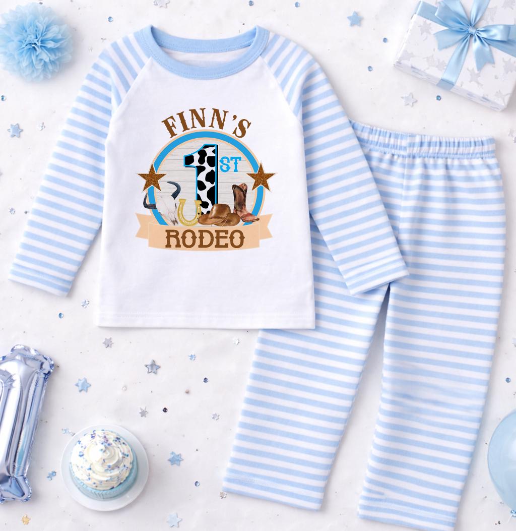 Close-up of the personalised name printed on the blue stripe pyjama top