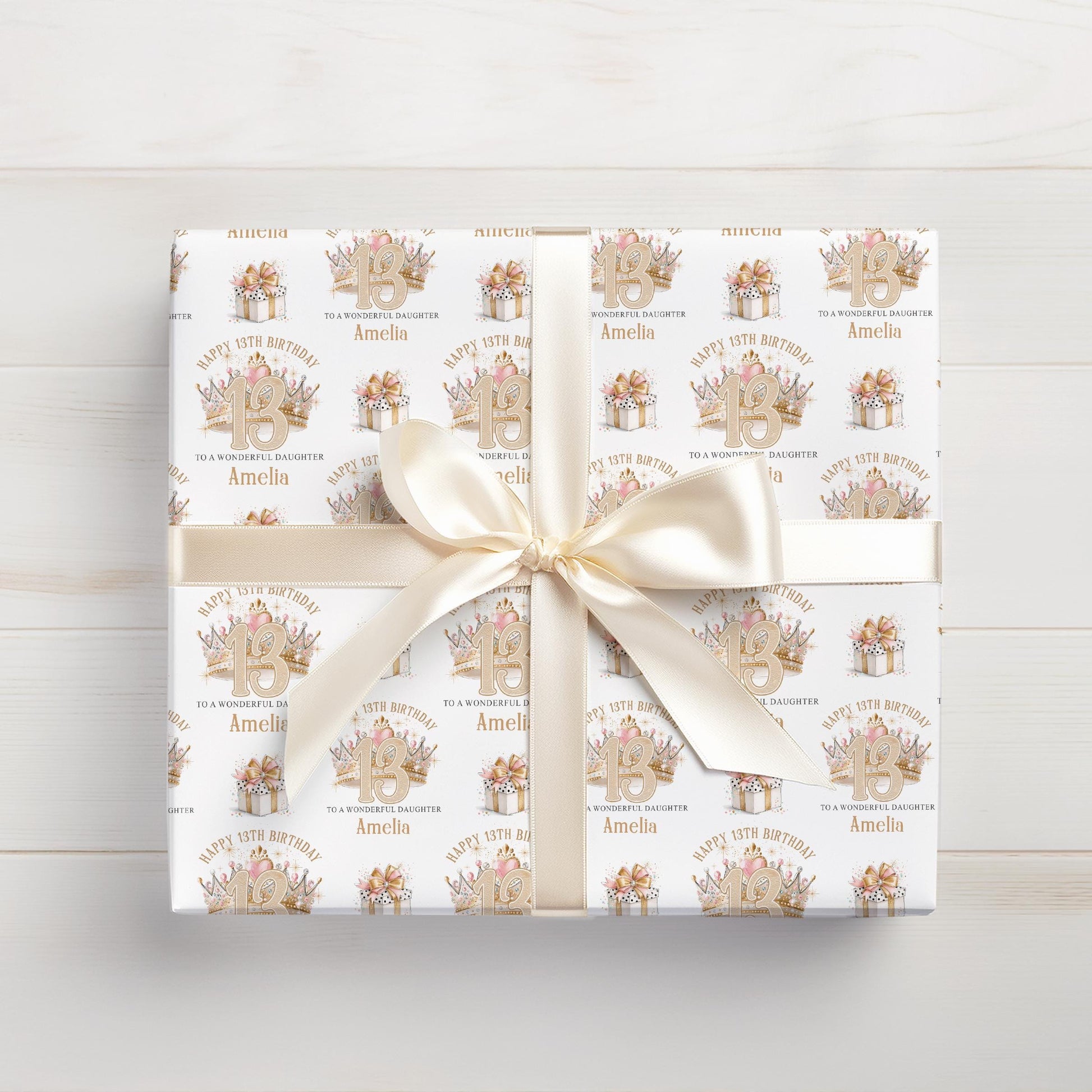 Roll of personalised glitter crown wrapping paper packaged in a postal tube ready for delivery.