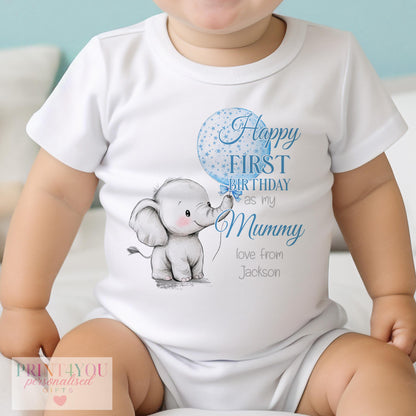 Close-up of the starry elephant and balloon print with personalised name on baby clothing