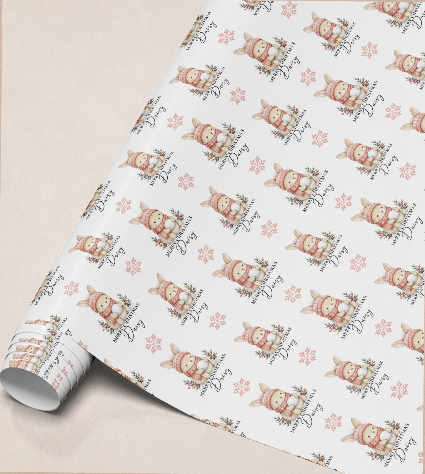 Close-up of the personalised bunny rabbit Christmas gift wrap roll design showing the custom name detail