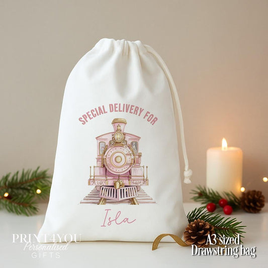 Personalised pink train Christmas sack, white A3 drawstring gift bag printed with a pastel pink and gold steam train and Special Delivery For a name