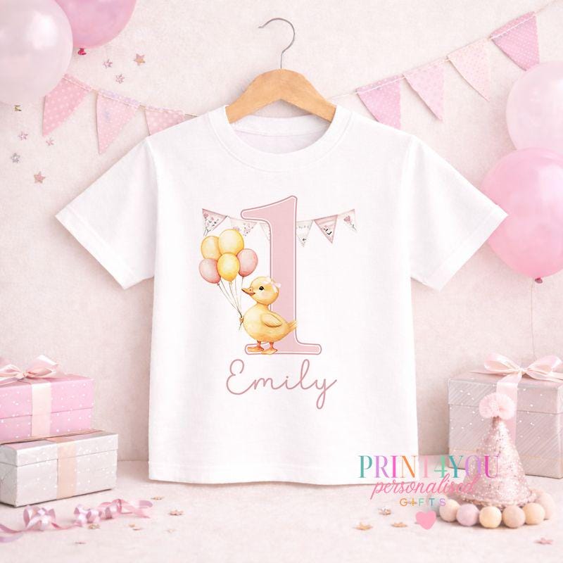 Close-up of the duck design and personalised name print on the pink striped pyjamas