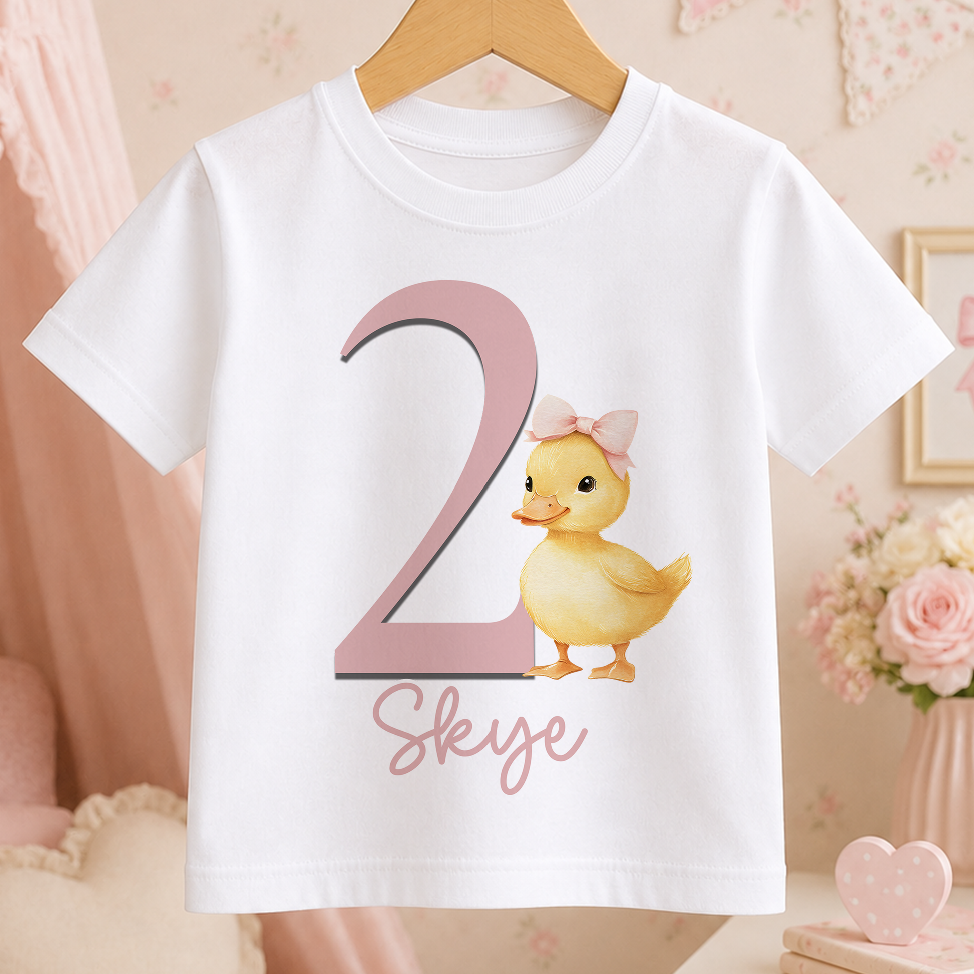 White cotton t-shirt with pink duck design personalised with custom name and birthday age