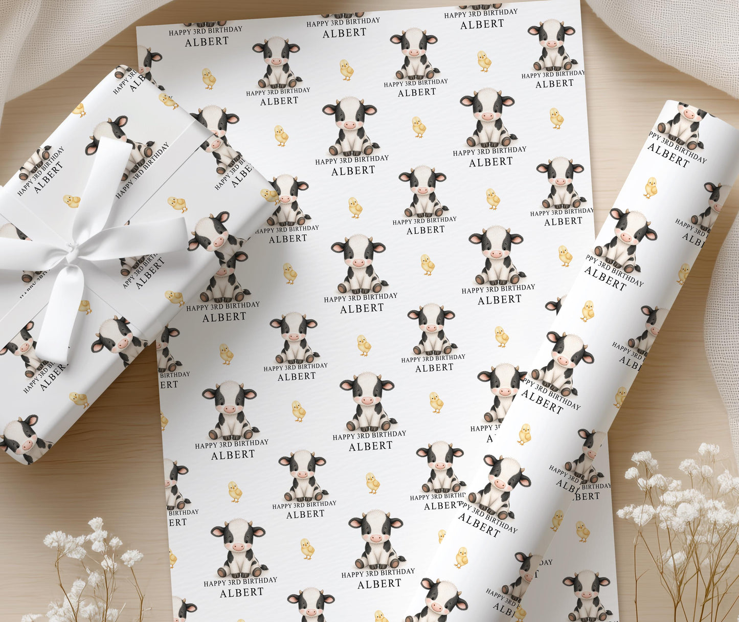 Close-up detail of the personalised cow wrapping paper pattern
