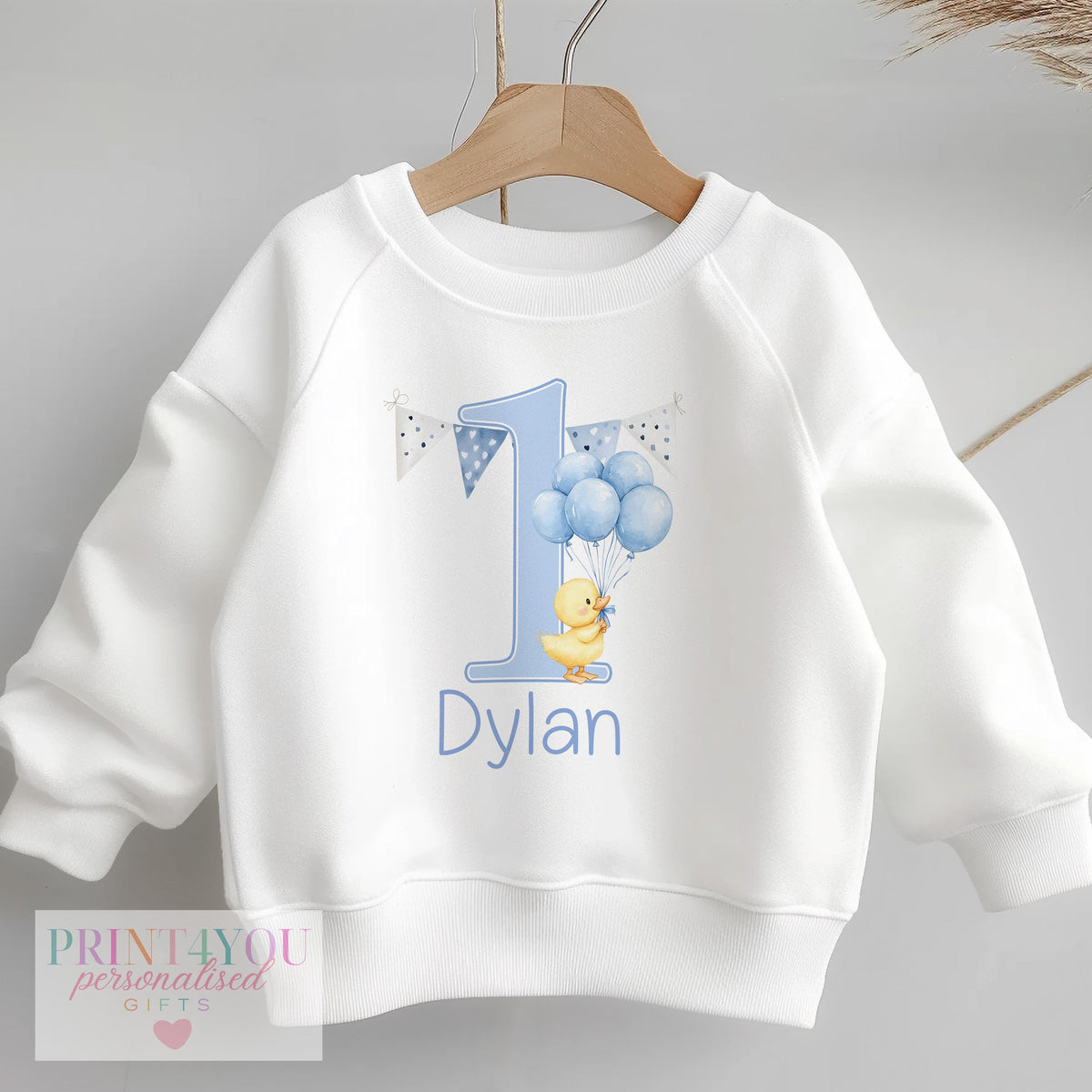 Personalised blue balloon duck first birthday sweatshirt in size 6-12 months with custom baby name