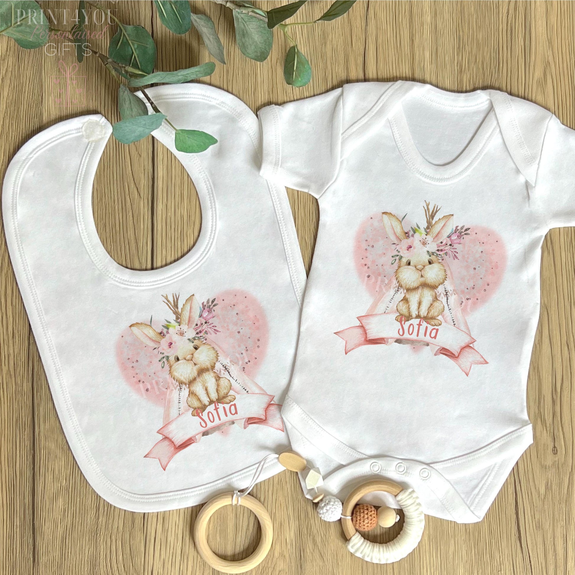 Personalised pink boho rabbit vest shown with a custom baby name added beneath the design.