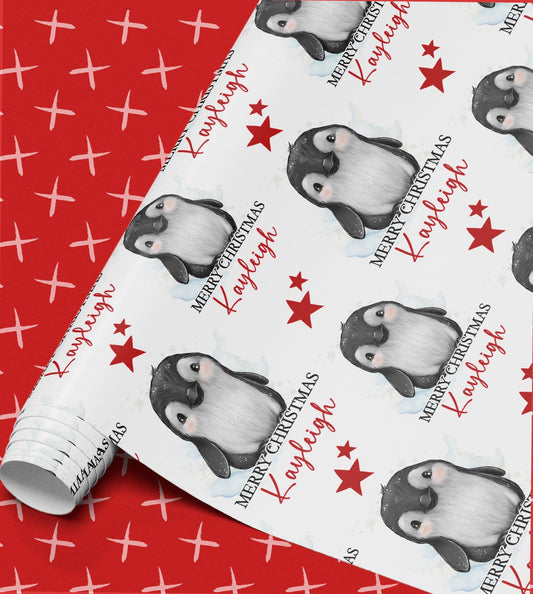 a pattern of penguins and stars on a red background.