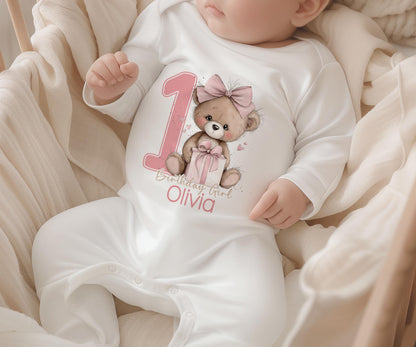 Pink teddy bear design personalised first birthday girl outfit, styled for a cake smash photo shoot.