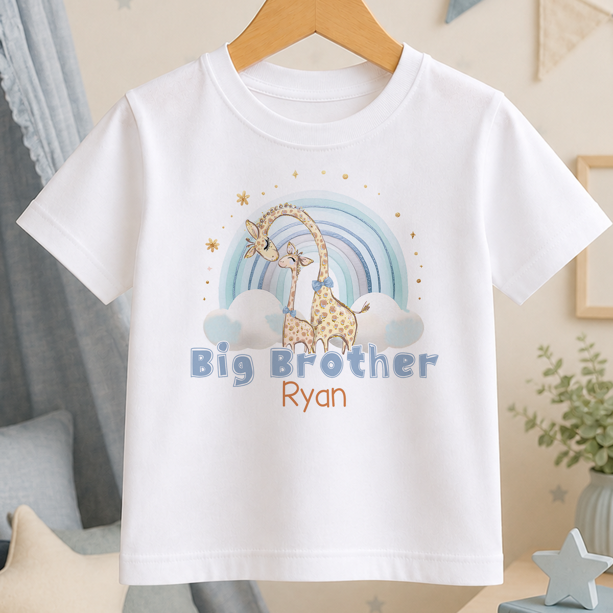 A white t-shirt with a graphic design featuring a giraffe and a rainbow, along with the text "Big Brother Ryan".