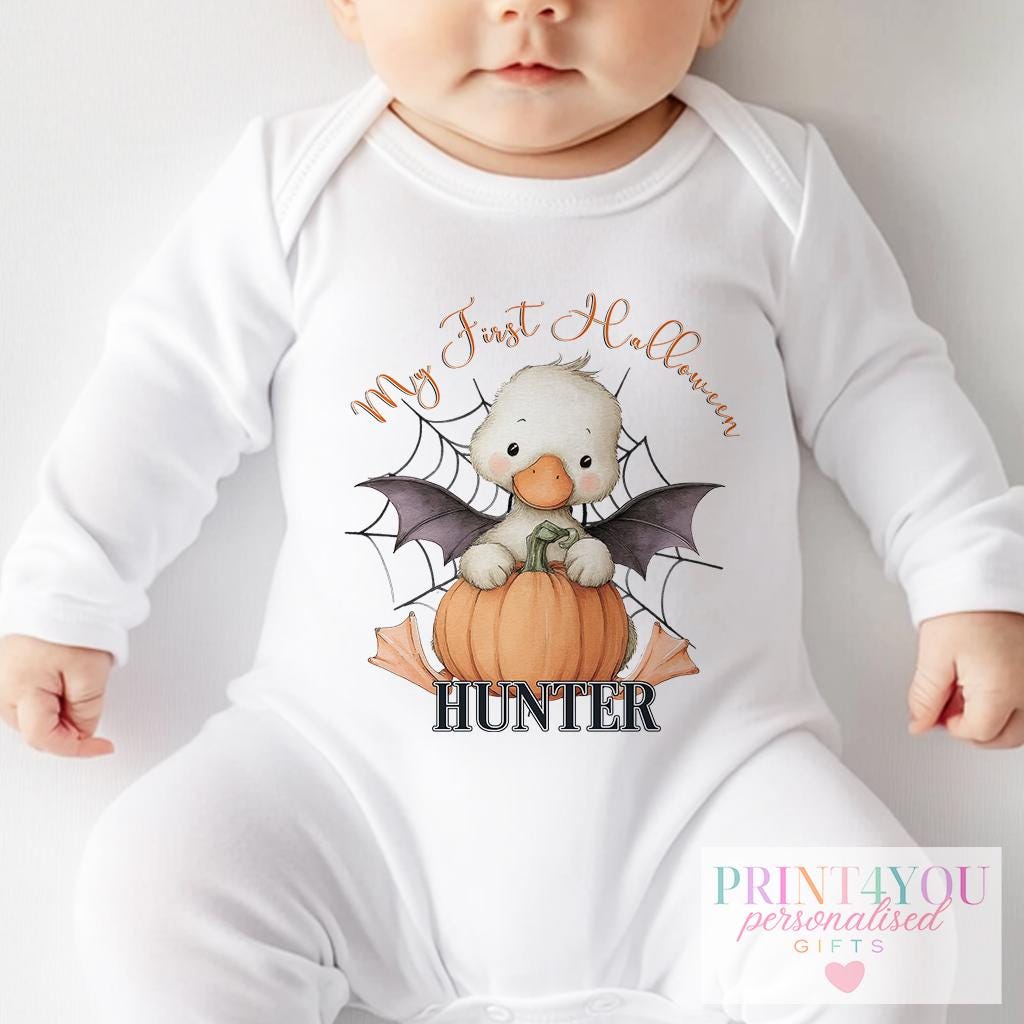 Personalised Halloween baby sleepsuit with the duck-in-pumpkin design, laid flat to show the full print