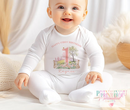 Personalised bunny rabbit first birthday vest laid flat, showing the printed name and design.