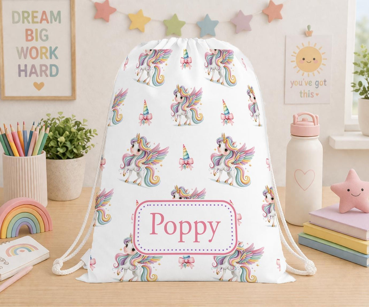 Personalised rainbow unicorn drawstring PE bag with the name Poppy printed on the front