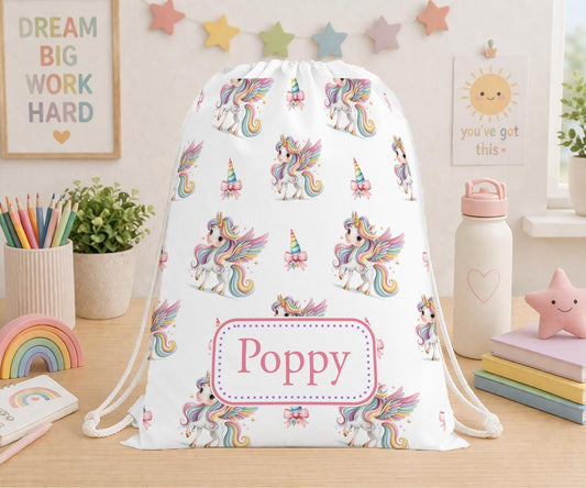 Personalised rainbow unicorn drawstring PE bag with the name Poppy printed on the front