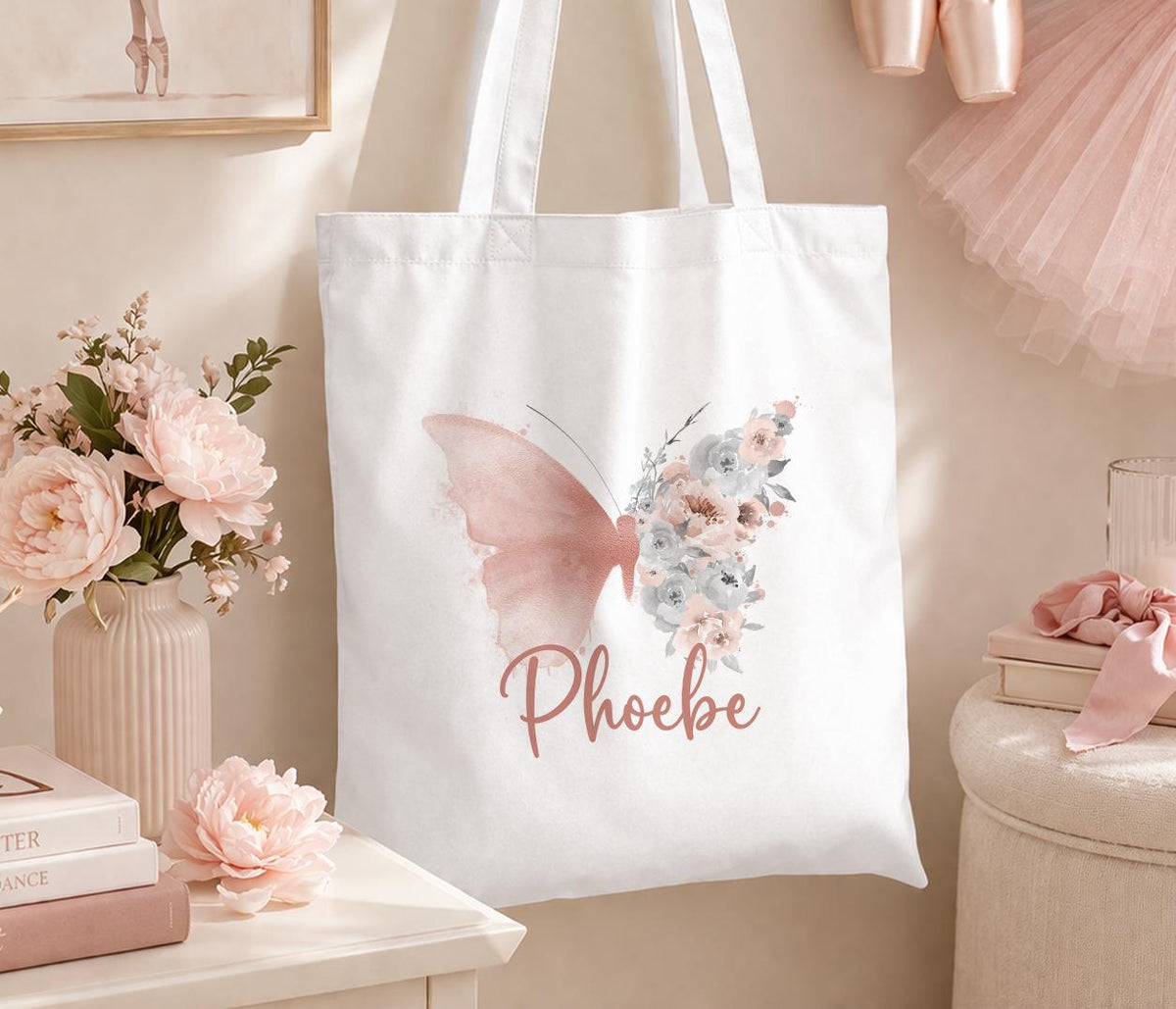 Cotton canvas tote bag printed with a blush pink floral butterfly design and personalised with a girl's name