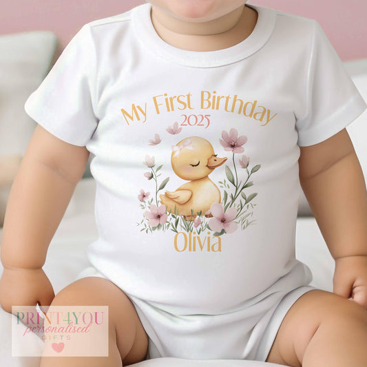 Personalised pink duck bib for baby girls, printed with a name on soft white cotton.