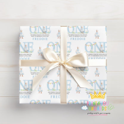 Close-up detail of the blue duck design on personalised 1st birthday wrapping paper