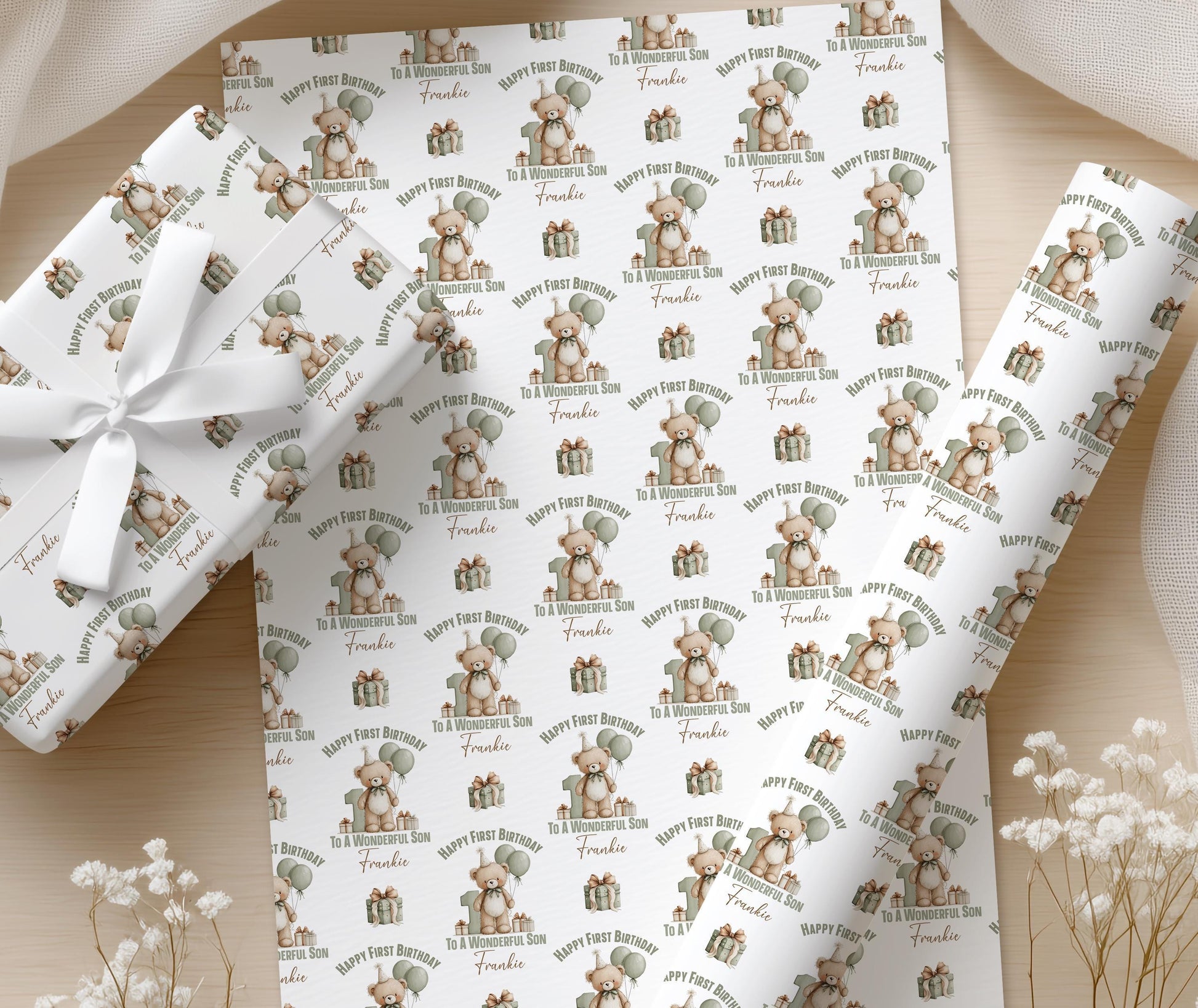 Roll of sage green teddy bear personalised first birthday wrapping paper shown in full pattern repeat.