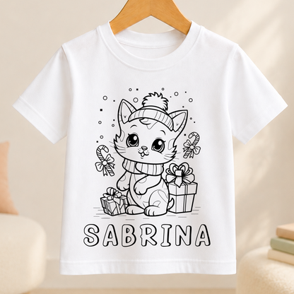 A white t-shirt with a black and white illustration of a cat wearing a hat and holding a gift box, along with the name "SARBRINA" written below the image.