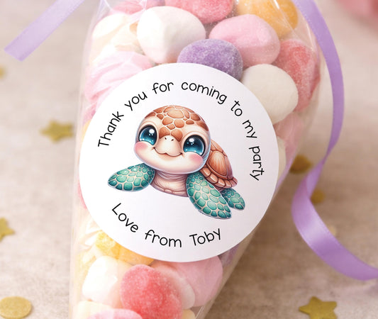 Round glossy stickers featuring a green sea turtle design, personalised with a child's name, for under-the-sea themed party bags