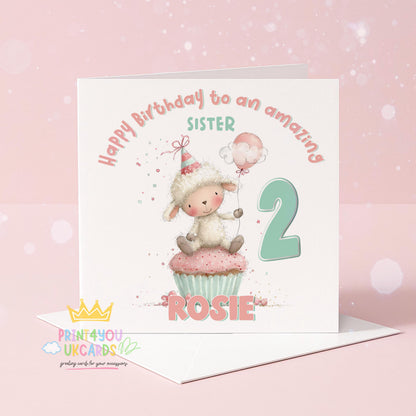 Square birthday card with a fluffy lamb wearing a party hat sitting on a pink cupcake beside a large number 2, personalised Happy Birthday to an Amazing Sister Rosie.