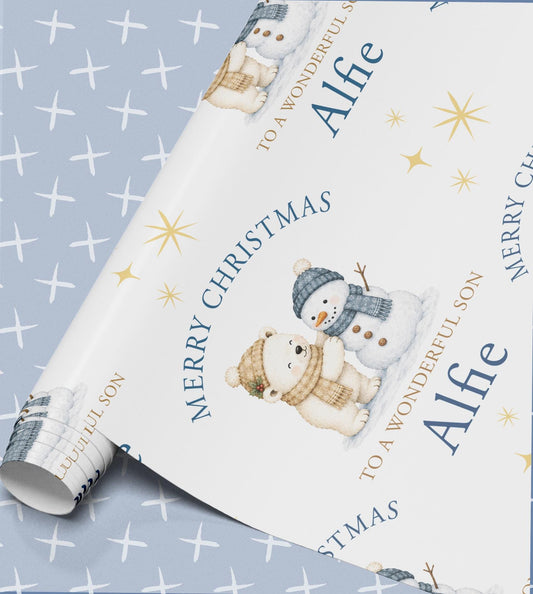 Wrapped Christmas present shown in the personalised polar bear and snowman gift wrap design