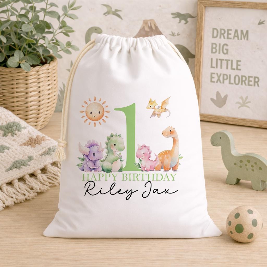 White A3 drawstring party bag printed with a dinosaur design and personalised child's name.