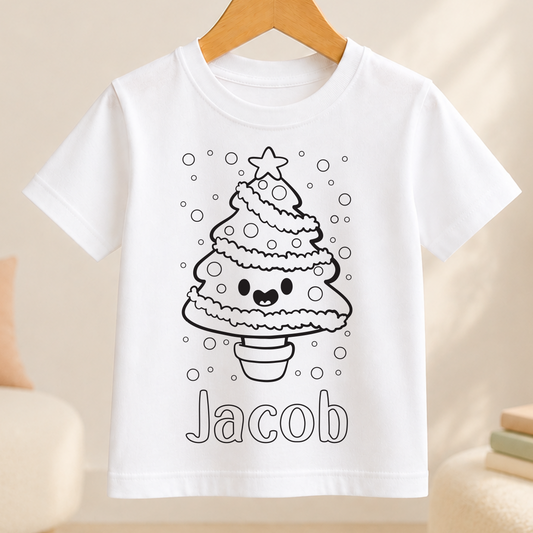 A white t-shirt with a black and white illustration of a Christmas tree and the name "Jacob" written below it.