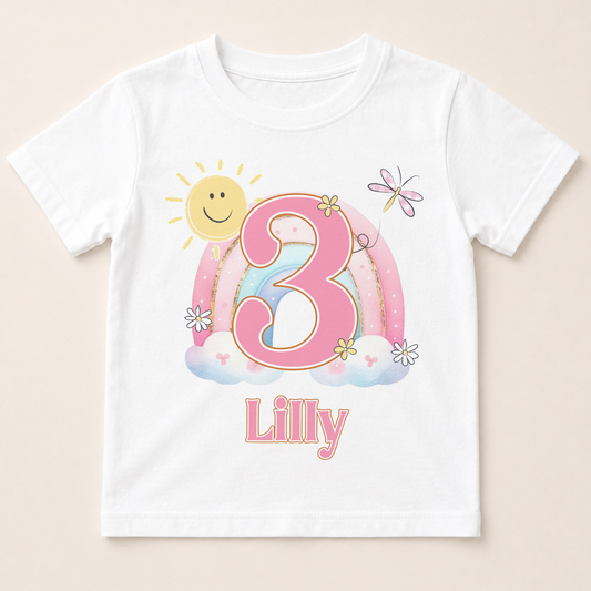 A white t-shirt with a personalized design featuring the number 3, flowers, and a sun.
