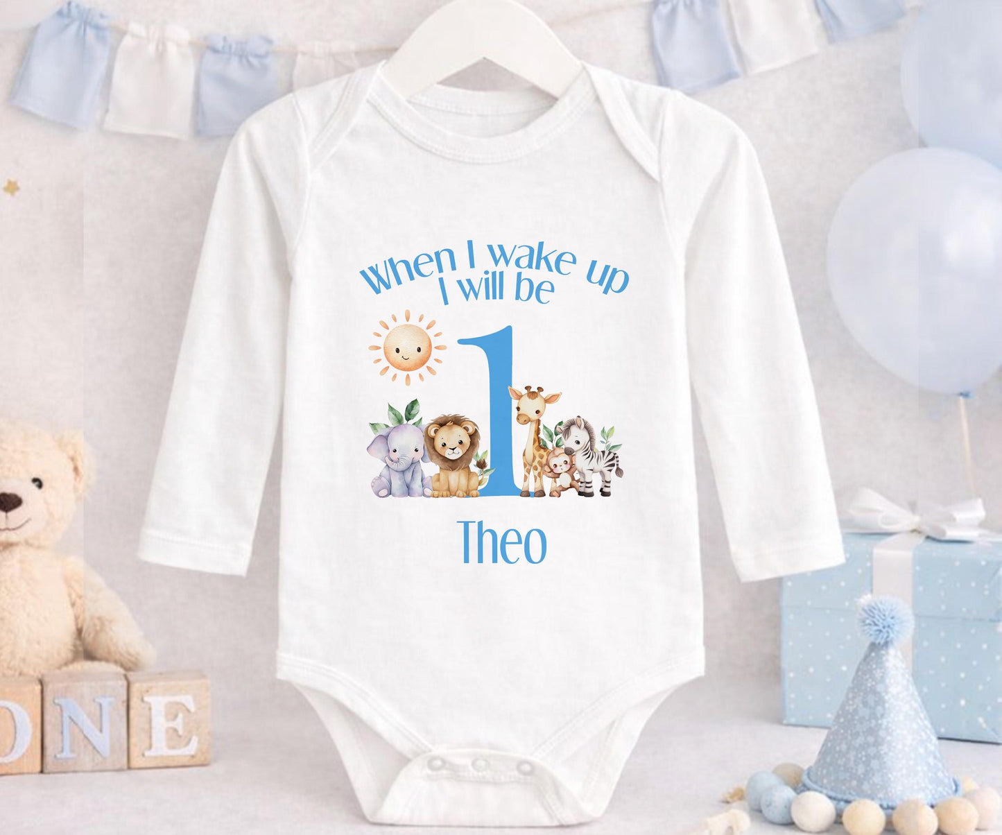 Front view of the personalised blue striped safari first birthday pyjamas