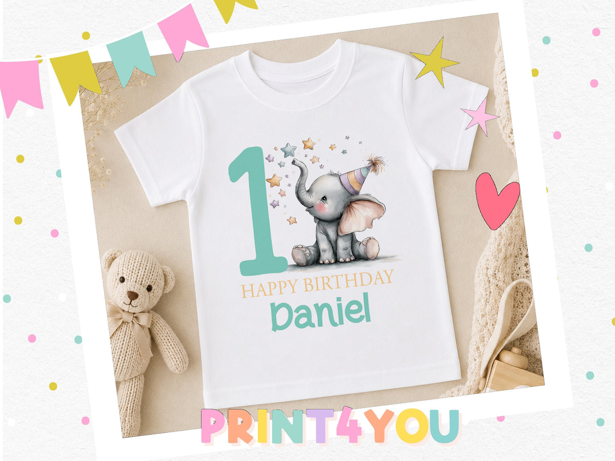 Personalised first birthday t-shirt with elephant design, styled with a teddy bear and birthday decorations